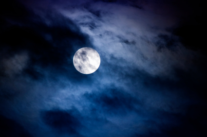full moon and clouds--blue-black night sky, haunting